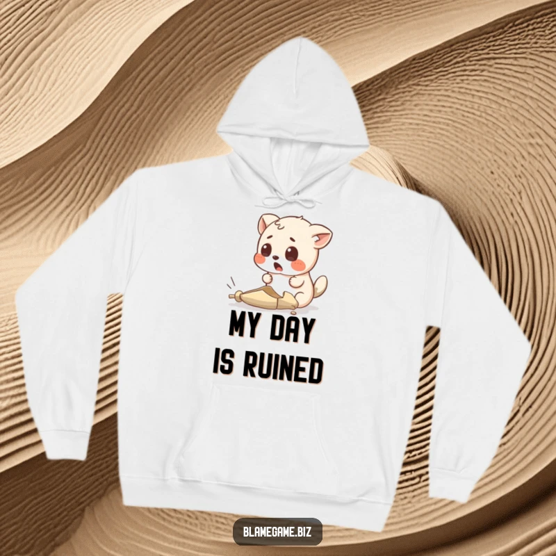 Funny hoodie featuring a surprised small animal looking at an absurdly tiny, broken object, ideal for cozy surprise.
